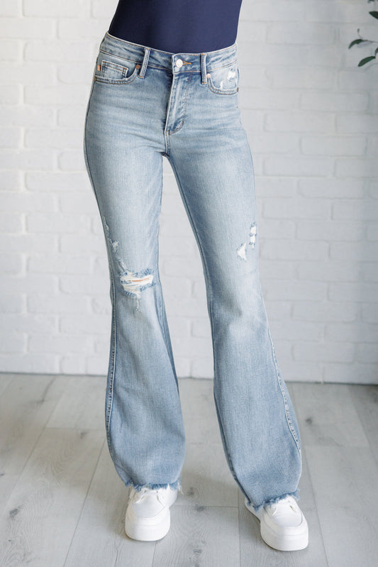 Mid Rise Control Top Distressed Flare Jeans