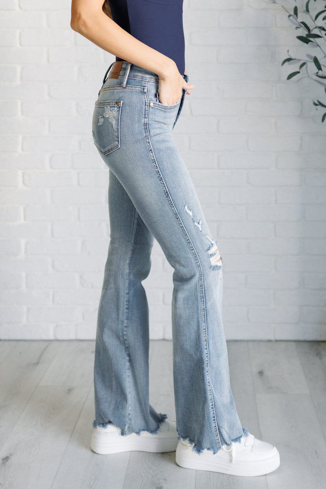 Mid Rise Control Top Distressed Flare Jeans